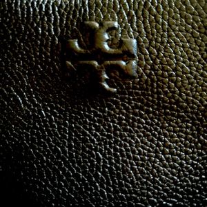 Beautiful black Tory Burch cross body phone bag with adjustable strap !!!!